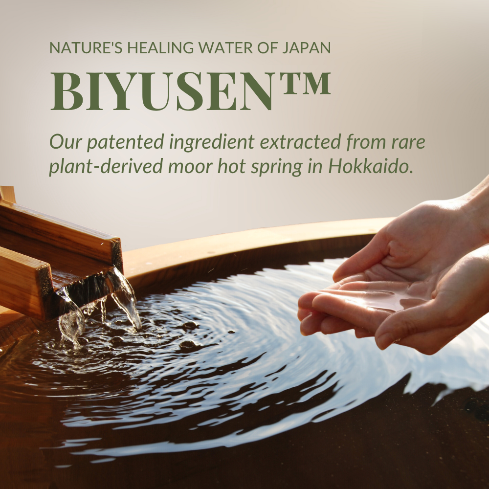 A person's hands gather water from a wooden basin filled by a spout, with text promoting IREN Shizen’s CLEARER DAYS Anti-Blemish Serum, featuring Hokkaido moor hot spring extract to help treat acne and improve skin clarity. #show-lang-en