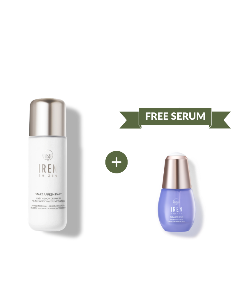 On the left is a white bottle from Fast Bundle’s FRESH AND CLEAR Cleansing Kit, with a smaller purple “Free Serum” bottle on the right—both set against a plain white background. This duo offers targeted anti-blemish care for your skincare routine.