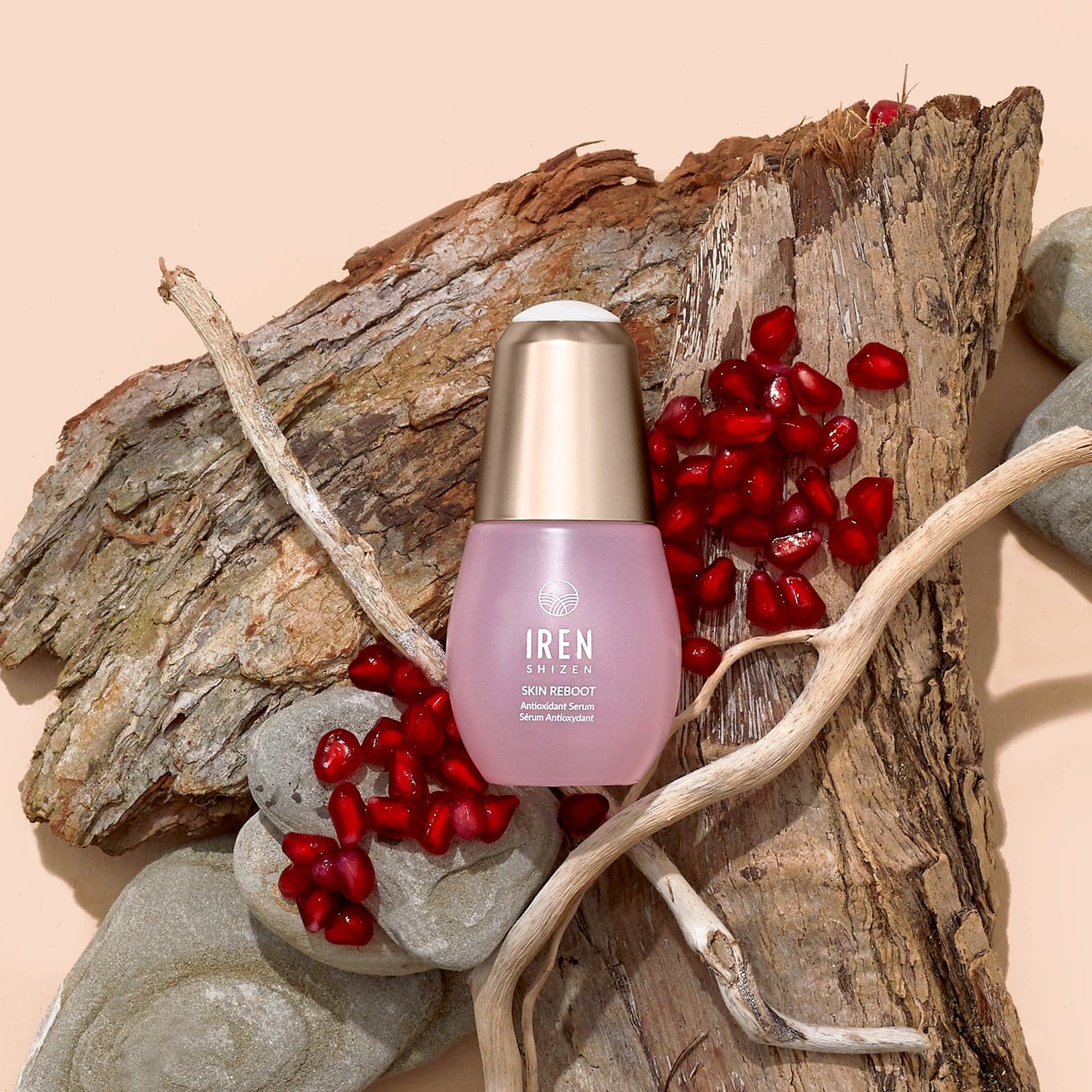 A bottle of customised Japanese SKIN REBOOT Antioxidant Serum by IREN Shizen on top of a piece of wood. #all-groups