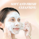 A person uses the IREN Shizen Facial Cleansing Brush with ultra-soft bristles and a foaming cleanser, while “SOFT AND FRESH CLEANSING” appears in the background.
