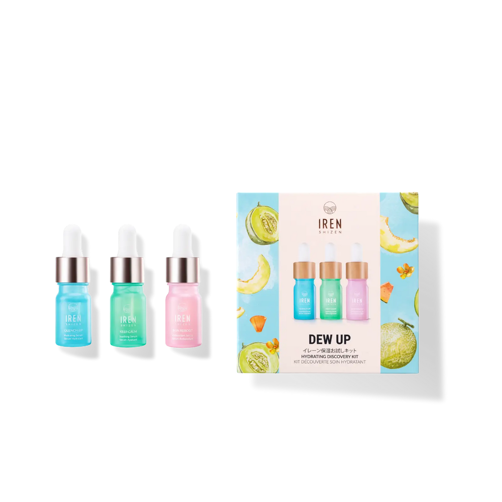 A Japanese skincare discovery kit featuring DEW UP Hydrating serum and a customized fruit bottle from IREN Shizen.
