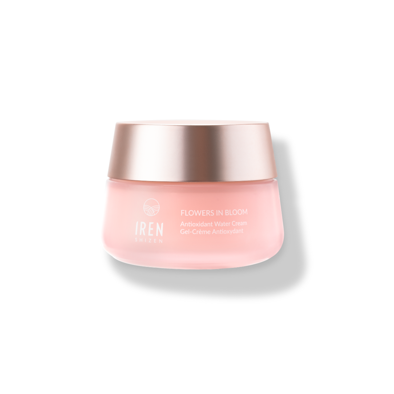 Rose-tinted cosmetic jar with metallic lid labeled "IREN Shizen FLOWERS IN BLOOM Antioxidant Water Cream" on a white background.