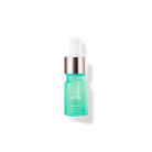 A green bottle of KEEP CALM Soothing Serum with a white lid on a black background by IREN Shizen.